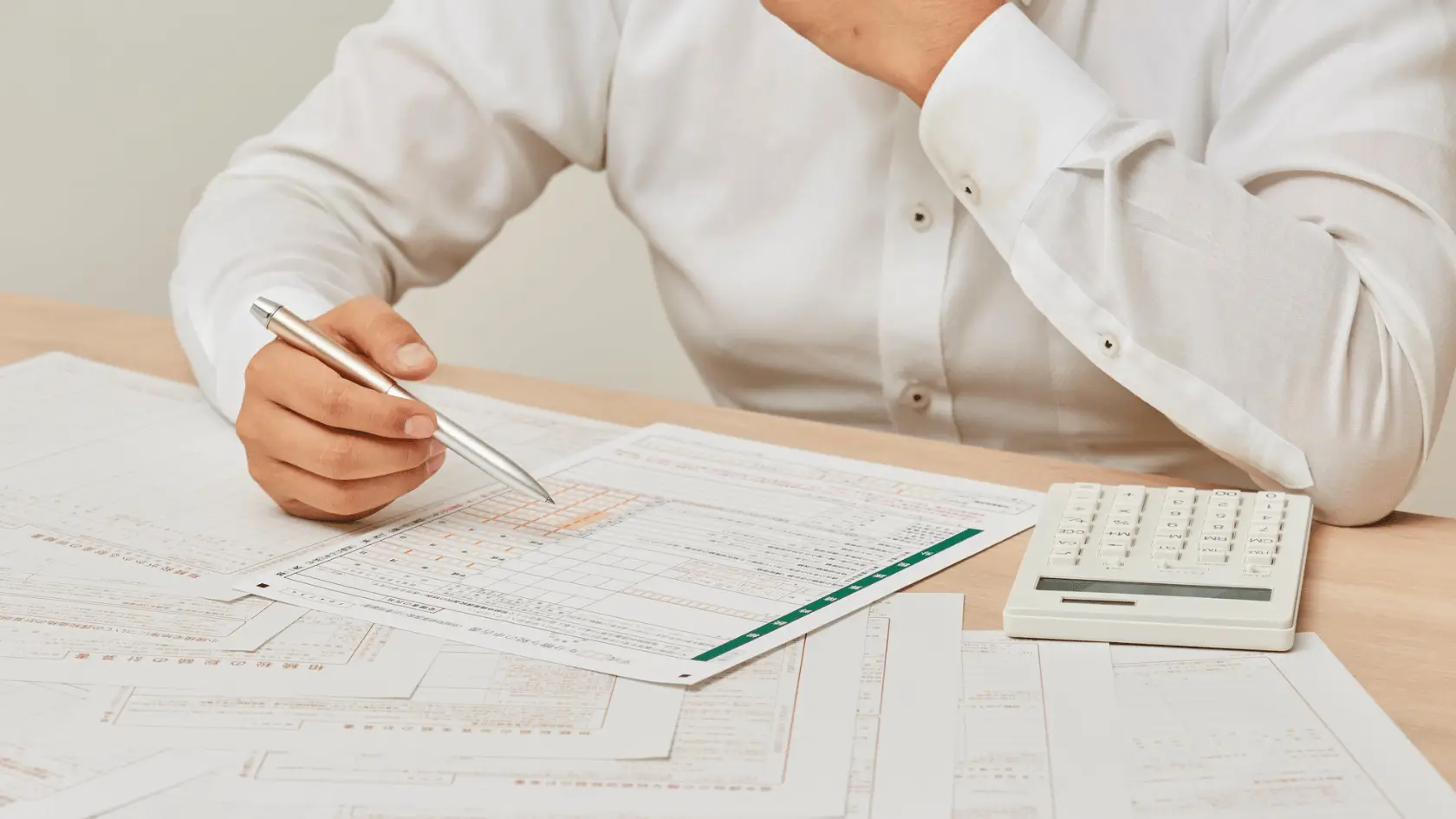 CPA reviewing tax planning documents and strategy with a financial advisor