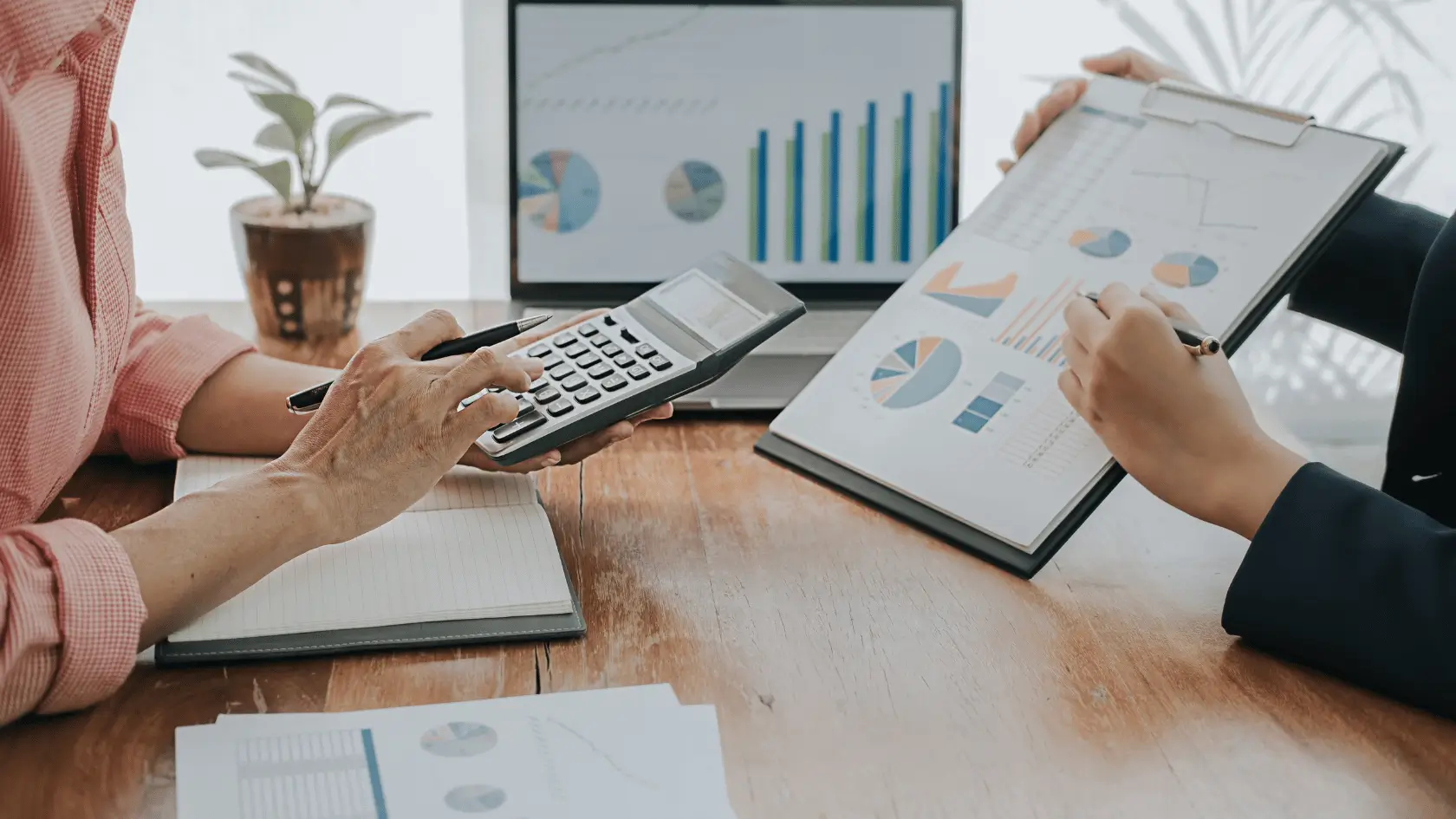 Two professionals reviewing a financial planning gap analysis framework together