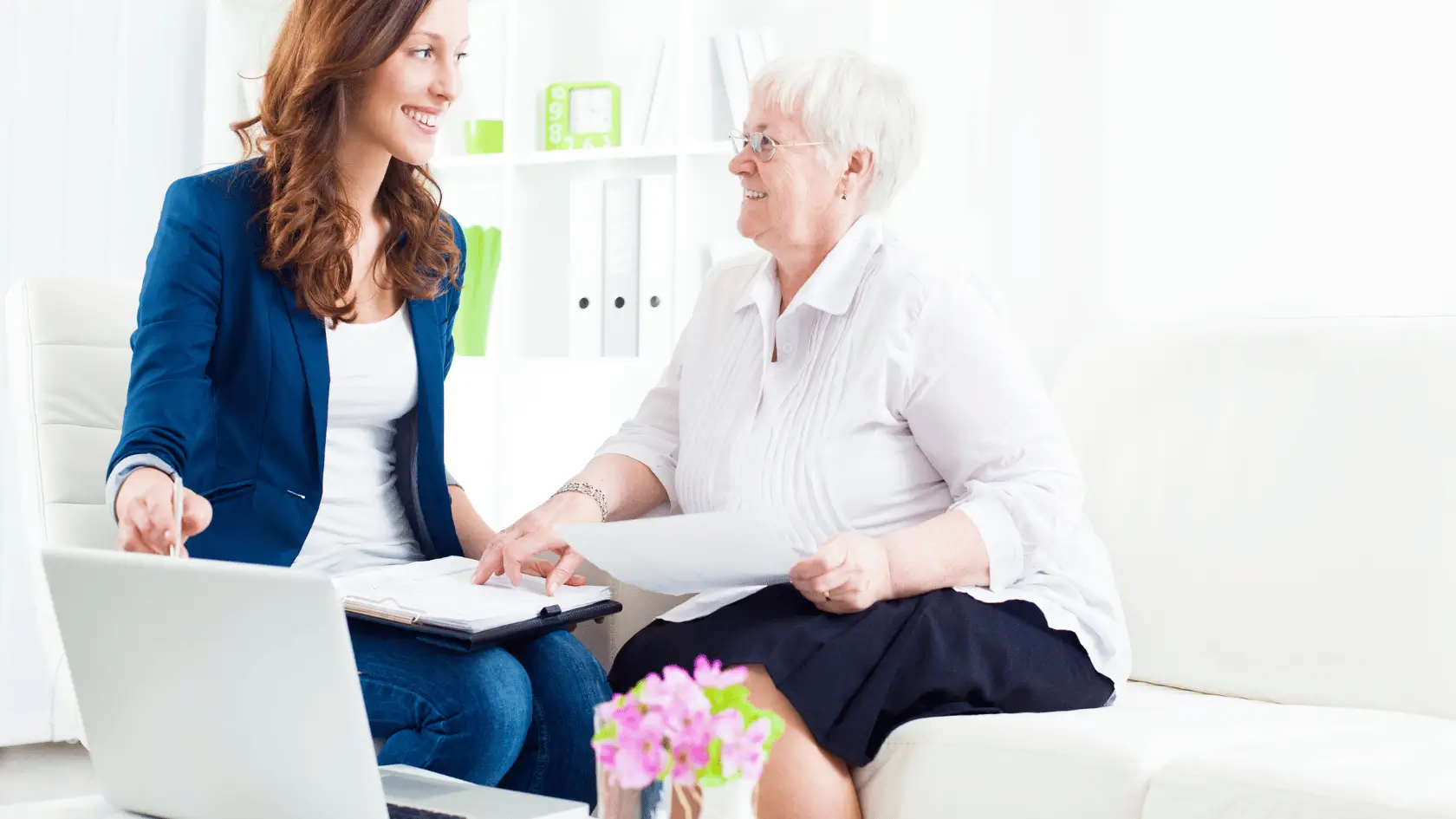 Advisor reviewing personal and business financial planning documents with a client