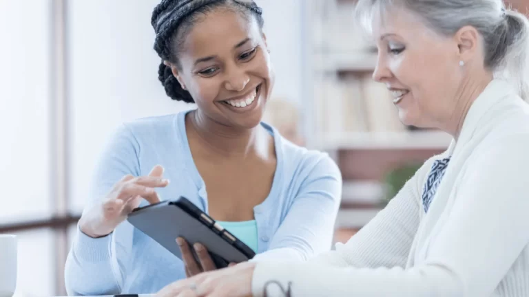 Business owner and financial advisor reviewing a complete financial game plan together