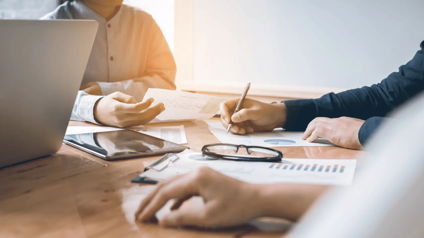 CPA and financial advisor working side by side reviewing a client collaboration strategy