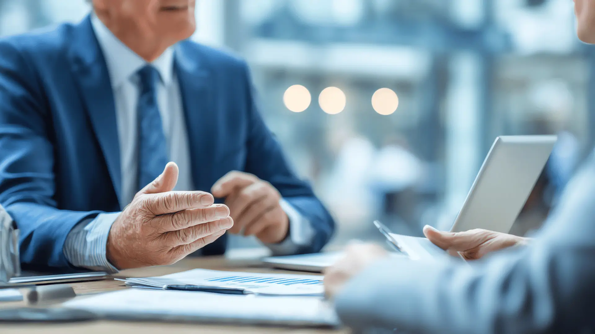 Senior financial advisor presenting tax-smart coordination strategy to client